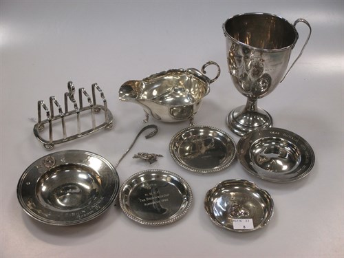 Lot 248 - A silver two handled cup, a silver sauce boat,...