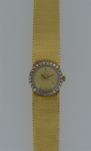 Lot 361 - Omega - A lady's 18ct gold and diamond wristwatch