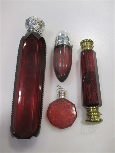 Lot 181 - A collection of cranberry glass scent bottles (4)