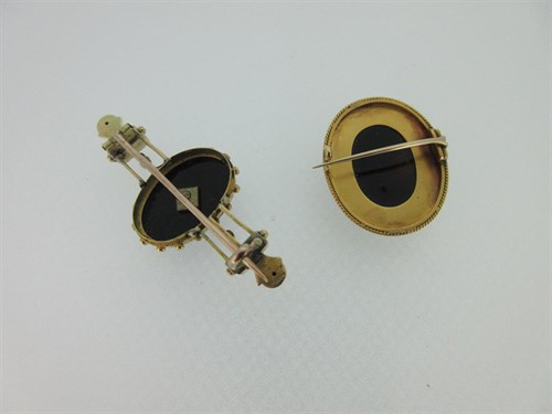 Lot 276 - A Victorian sardonyx cameo together with an onyx and seed pearl brooch