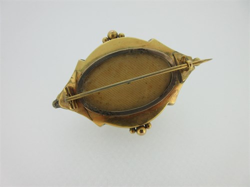Lot 296 - A Victorian turquoise enamel and seed pearl brooch