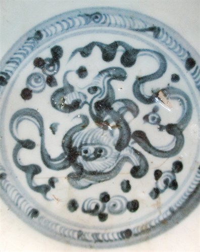 Lot 49 - An early provincial  Ming dynasty barbed rim dish