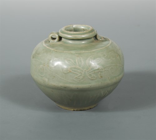 Lot 51 - An early Ming dynasty celadon jarlet