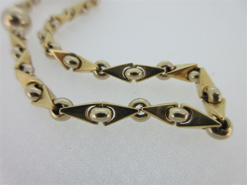 Lot 359 - An Italian fancy link bracelet marked for 18ct gold