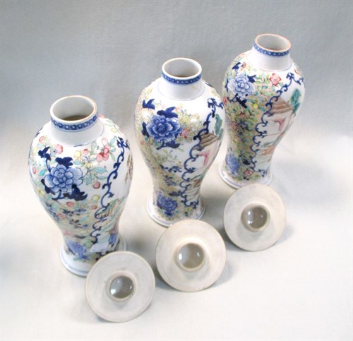 Lot 76 - Five famille rose and blue and white vases, late 18th or early 19th century