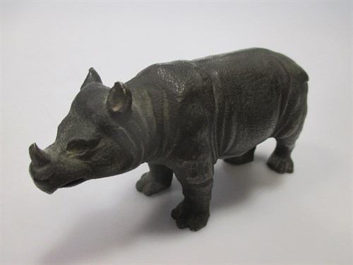 Lot 103 - A bronze model of a Rhinoceros approx 5cm high