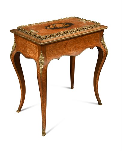 Lot 630 - A mid-19th century figured walnut jardiniere