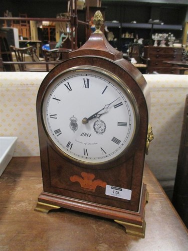 Lot 128 - A 19th century style mahogany mantle clock