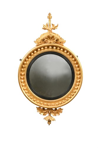 Lot 610 - A Regency gilt framed convex wall mirror