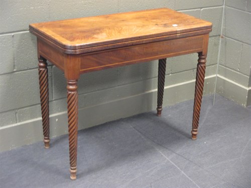 Lot 407 - A Regency mahogany card table, on rope twist legs