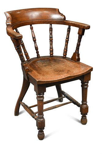 Lot 118 - In the manner of E. W. Godwin for James Peddle, an Aesthetic period oak elbow chair