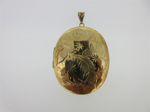 Lot 29 - A 9ct gold engraved locket