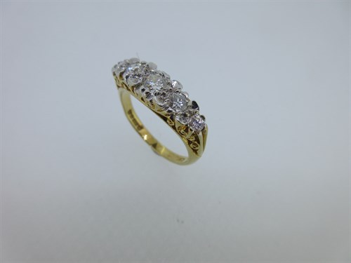 Lot 212 - An 18ct gold five stone diamond ring