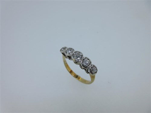 Lot 17 - A five stone diamond ring