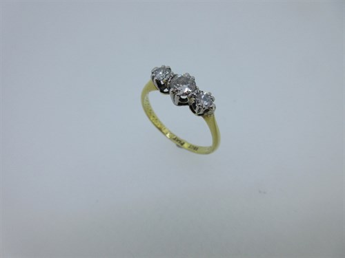 Lot 168 - A three stone diamond ring