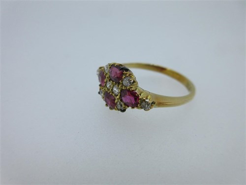Lot 195 - A pink sapphire and diamond quatrefoil ring
