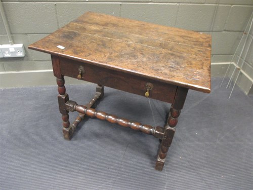 Lot 509 - A 17th century oak side table
