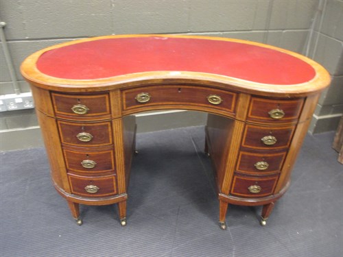 Lot 436 - A late 19th century mahogany kidney shaped...