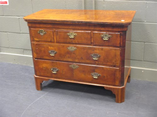 Lot 385 - A George I and altered walnut veneered chest...