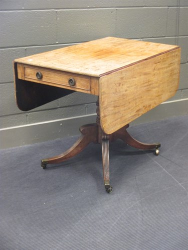 Lot 449 - A Regency mahogany Pembroke table, on four...