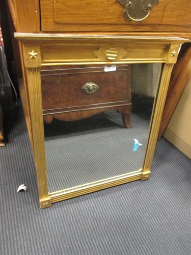 Lot 491 - A Regency style gilt wood small wall mirror