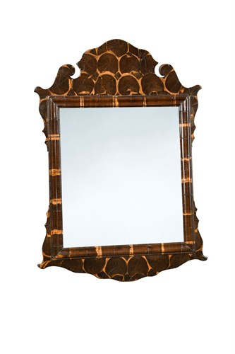 Lot 517 - A George III oyster veneered tulipwood fret framed wall mirror