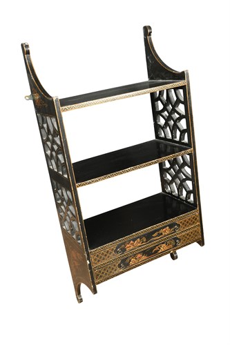 Lot 621 - An Edwardian black and gilt lacquer hanging wall shelf