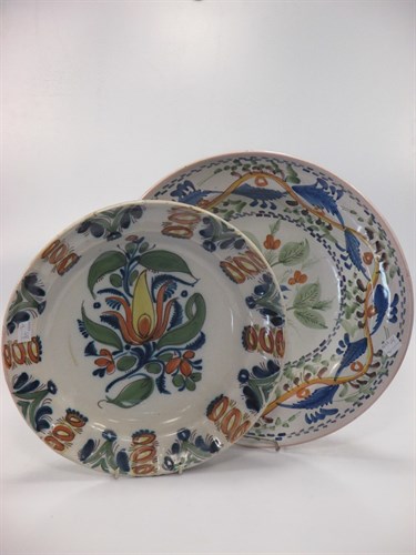 Lot 24 - Two painted tinglaze dishes, 19th and 20th...