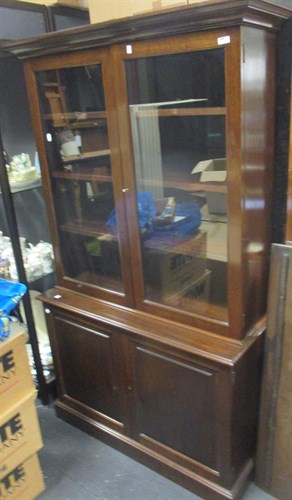 Lot 413 - A glazed top mahogany bookcase by Robin Flack...