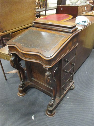 Lot 422 - A 19th century burr walnut Davenport desk