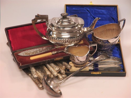 Lot 293 - A quantity of silver handled table knives, a...