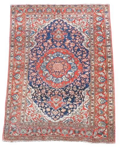Lot 665 - A pair of North West Persian red ground rugs, (2)