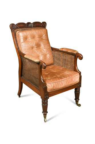 Lot 611 - A Regency mahogany bergere library armchair