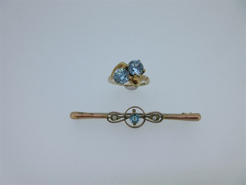 Lot 128 - A blue zircon two stone ring together with a bar brooch
