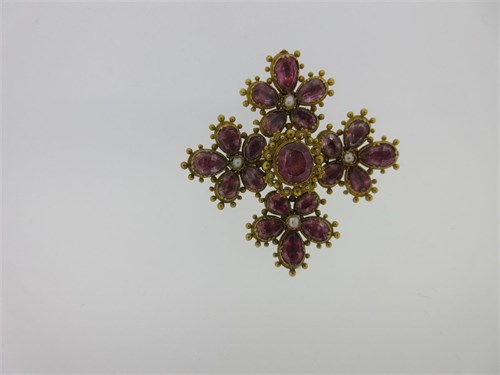 Lot 192 - A Georgian pink foiled topaz, seed pearl and cannetille work jewel