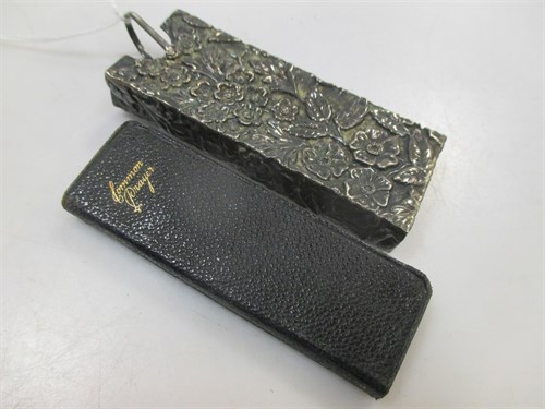 Lot 182 - A late Victorian silver foliate patterned case...
