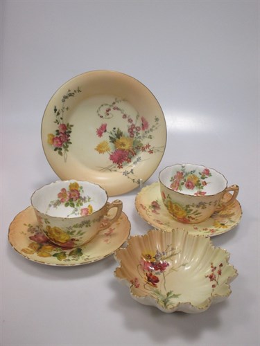 Lot 23 - A pair of Royal Worcester blush ivory cups &...