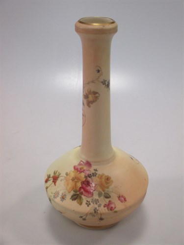 Lot 217 - A small Royal Worcester blush ivory vase