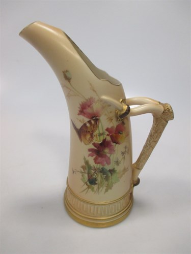 Lot 19 - A Royal Worcester blush ivory jug with faux...