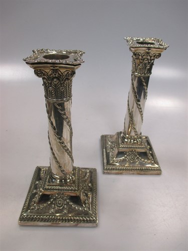 Lot 289 - A pair of plated silver candlesticks, approx...