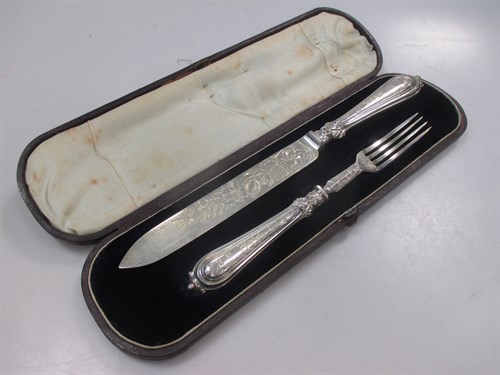 Lot 242 - A cased silver serving knife and fork