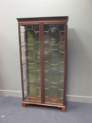Lot 477 - An Edwardian glazed mahogany display cabinet...