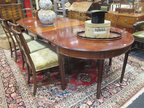 Lot 465 - A George III style mahogany D-end dining table...