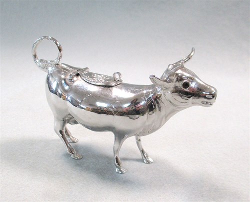 Lot 296 - A German metalwares silver semi naturalistic cow creamer