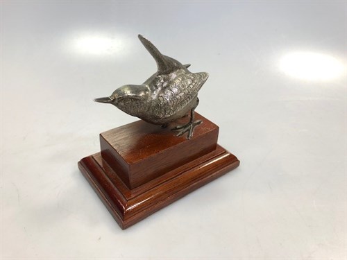 Lot 253 - A filled silver model of a wren