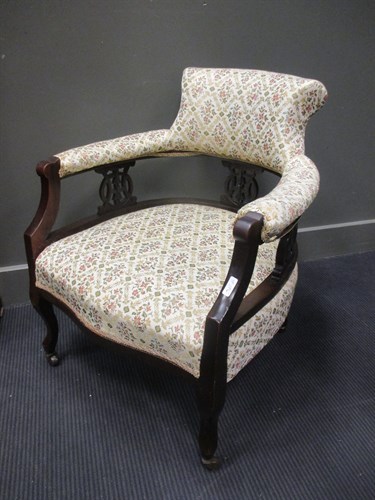 Lot 411 - A Victorian mahogany rocking armchair and a...