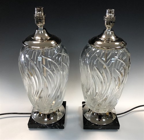 Lot 106 - A pair of modern cut glass and chromium plated table lamps