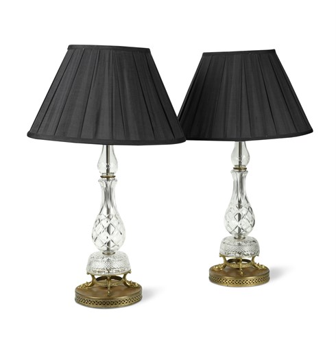 Lot 442 - A pair of cut glass table lamps