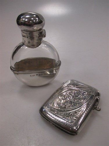 Lot 244 - A silver vesta case together with a miniature...