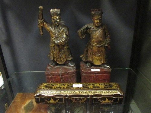 Lot 53 - A pair of Chinese carved wood gilt figures of...